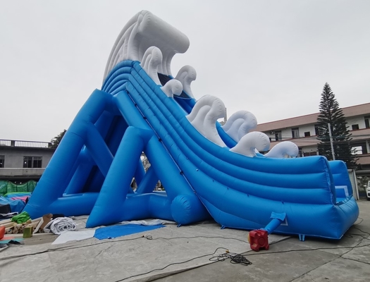ธีมการ์ตูนสไลด์น้ำทำให้พองยักษ์สำหรับผู้ใหญ่วัสดุผ้าใบกันน้ำ PVC กลางแจ้ง