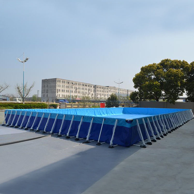0.9mm Tarpaulin Metal Frame สระว่ายน้ำเคลื่อนที่เหนือพื้นดินสระว่ายน้ำเป่าลมกลางแจ้ง